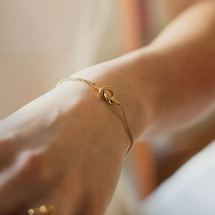 Gold-colored braided bracelet