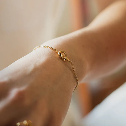 Gold-colored braided bracelet