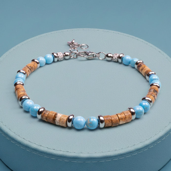 Bracciale Maratea artigianale in aulite e diaspro su sfondo turchese, Lab93Studio