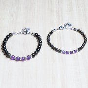 Coppia di bracciali in ossidiana e ametista