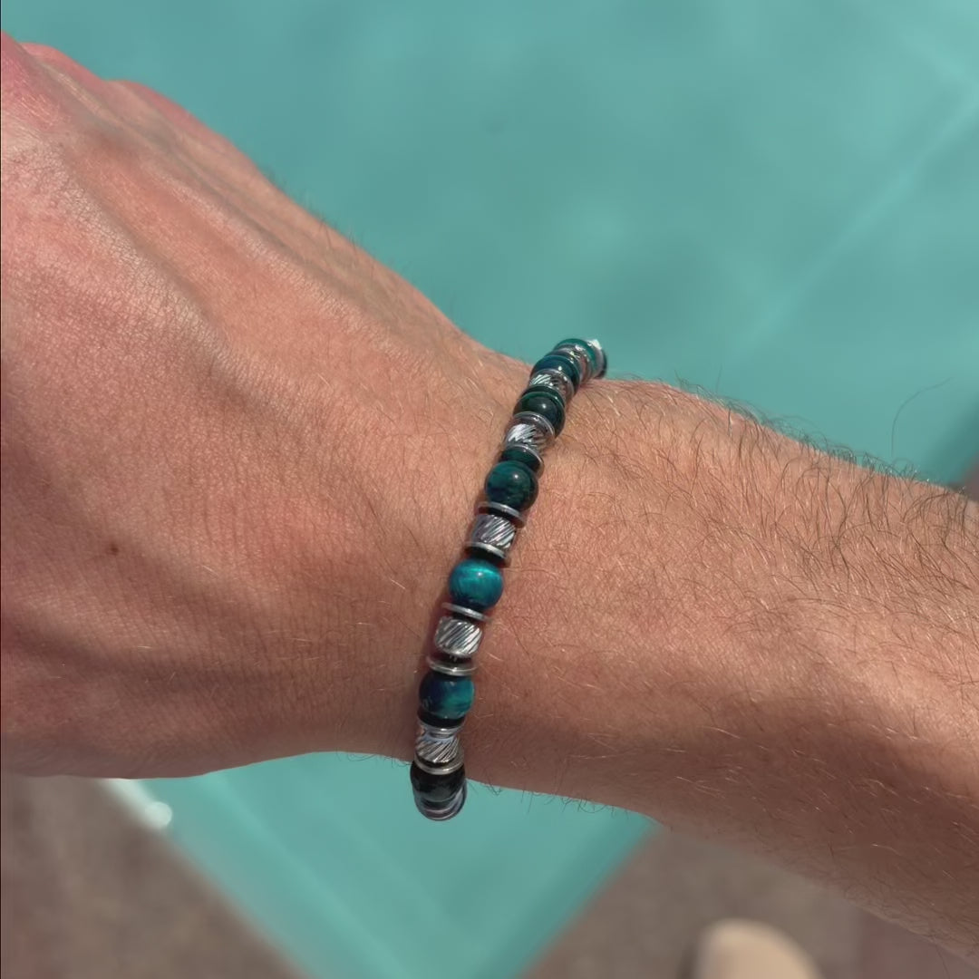 Carica video: Bracciale Essenza in occhio di tigre azzurro | 6mm