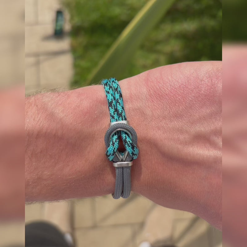 Bracciale Portofino Orione in paracord grigio e blu indossato al polso, video Lab93Studio