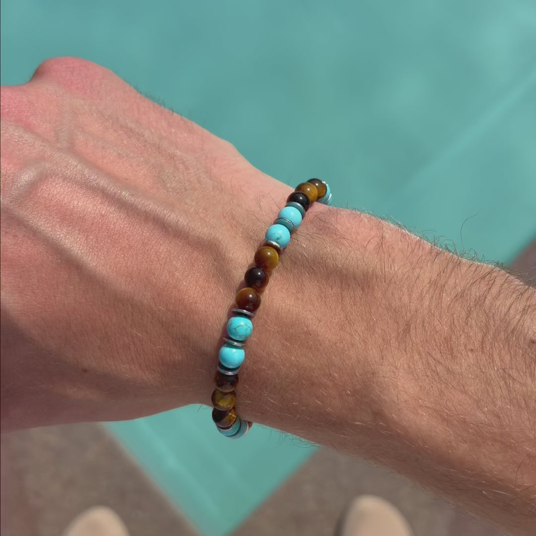 Carica video: Bracciale Respiro Mediterraneo in Occhio di tigre e Howlite turchese | 6mm