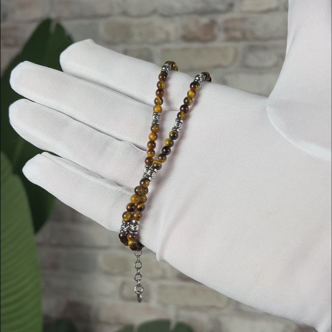 Video laden: Collana Terra in occhio di tigre marrone | 4mm