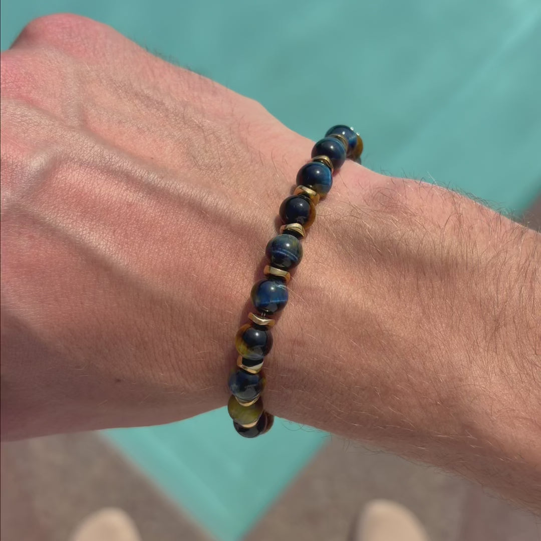 Carica video: Bracciale Adriatico in occhio di tigre ed ematite | 8mm